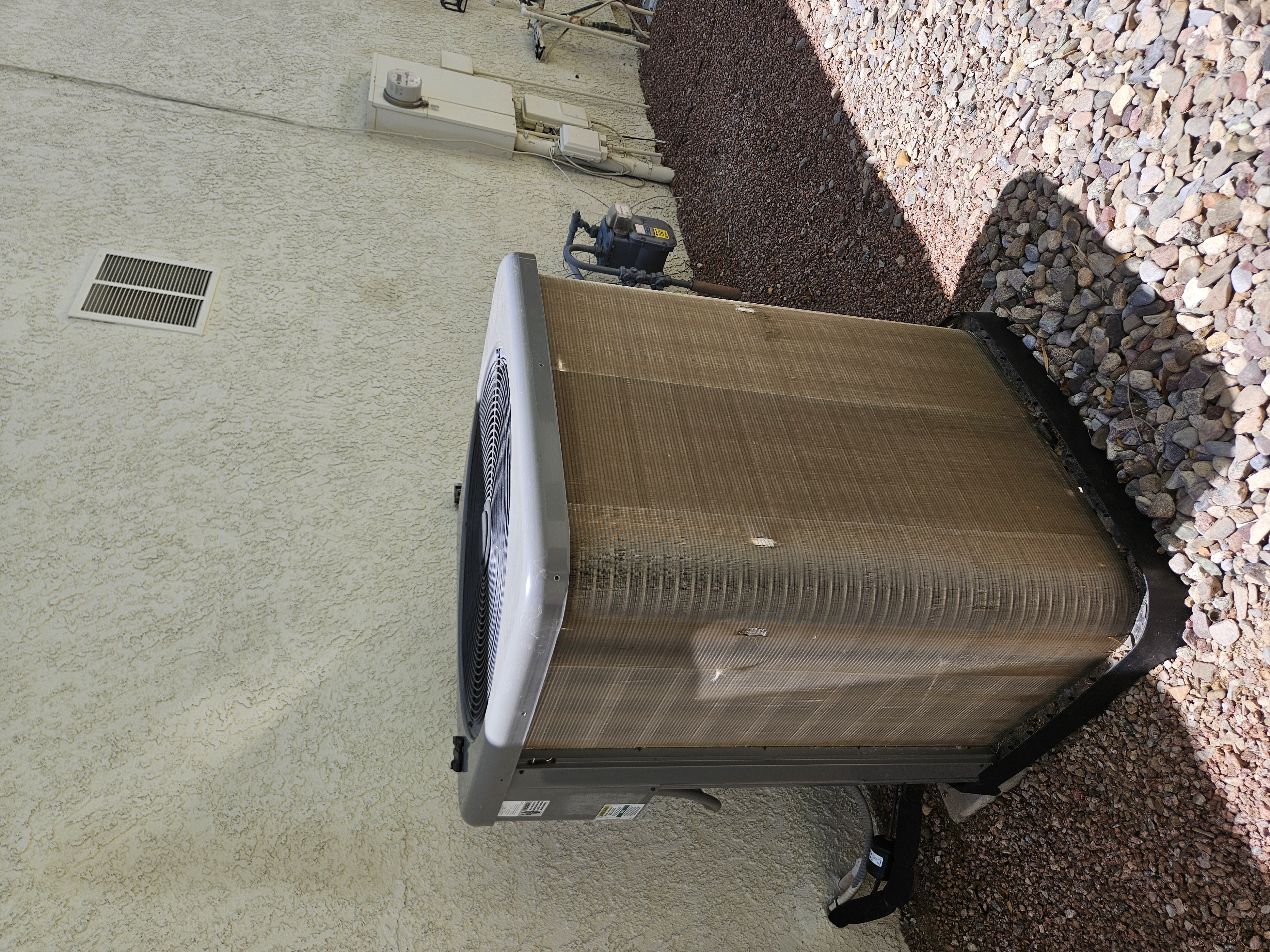 HVAC condenser unit before cleaning