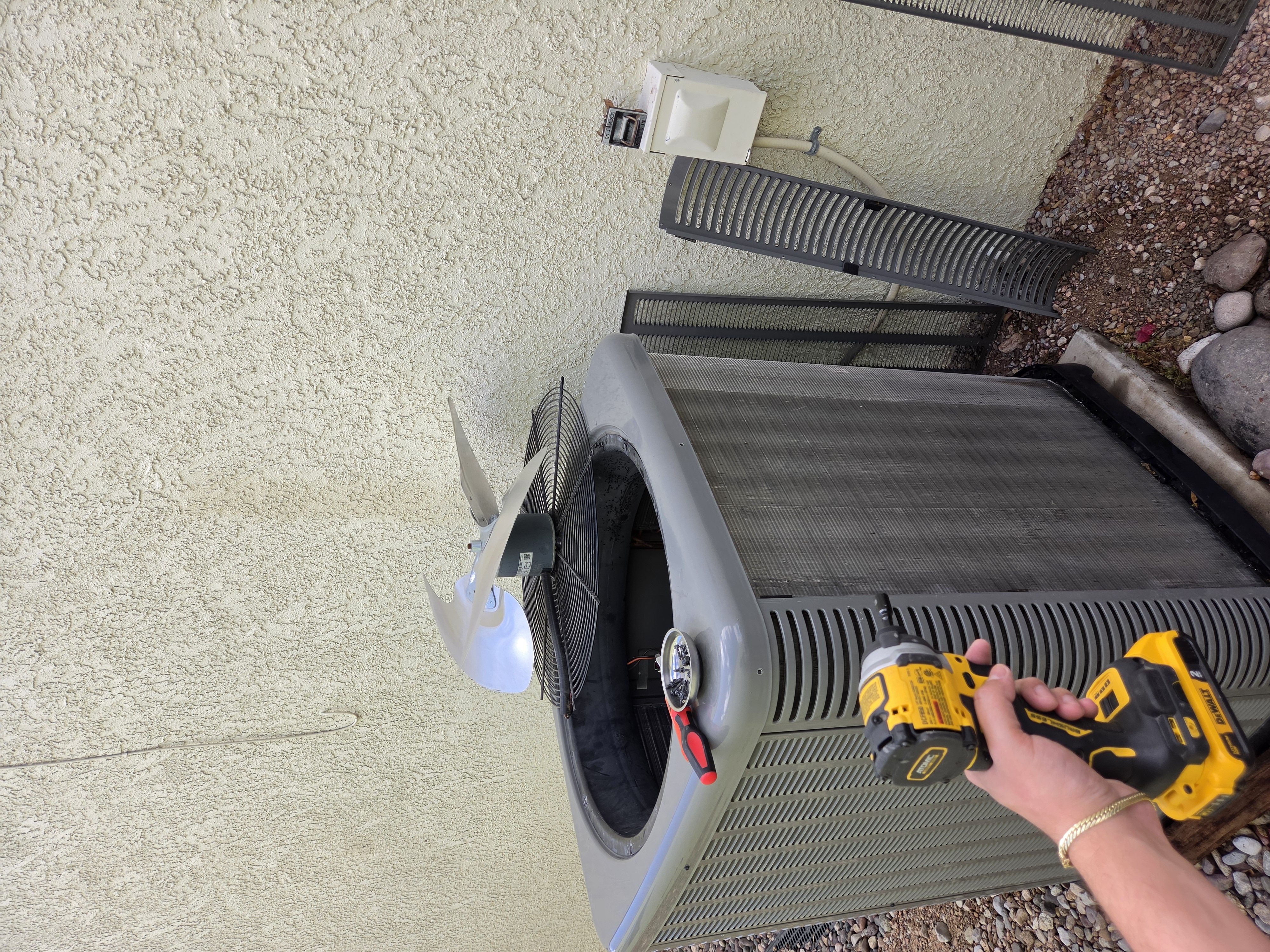 Condenser disassembly with tools staged for service