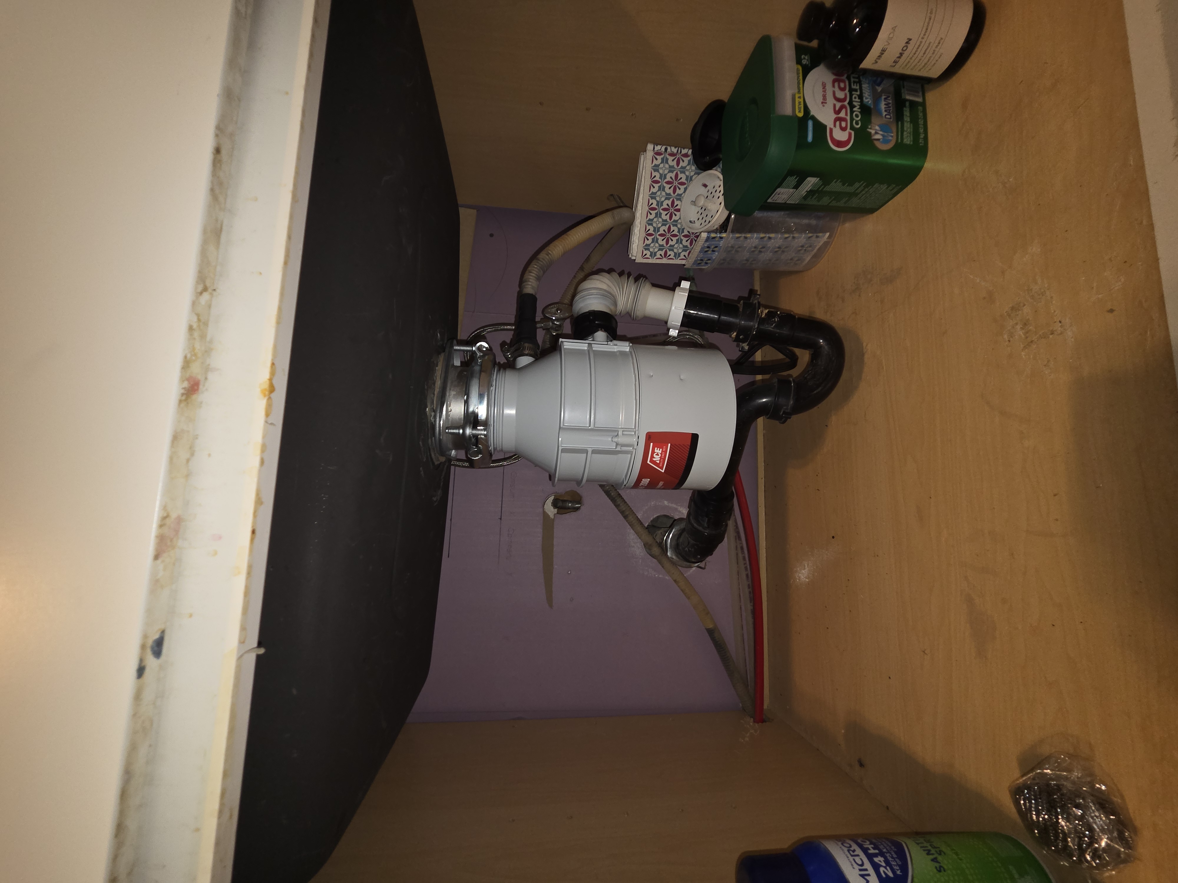 Garbage disposal installed under sink