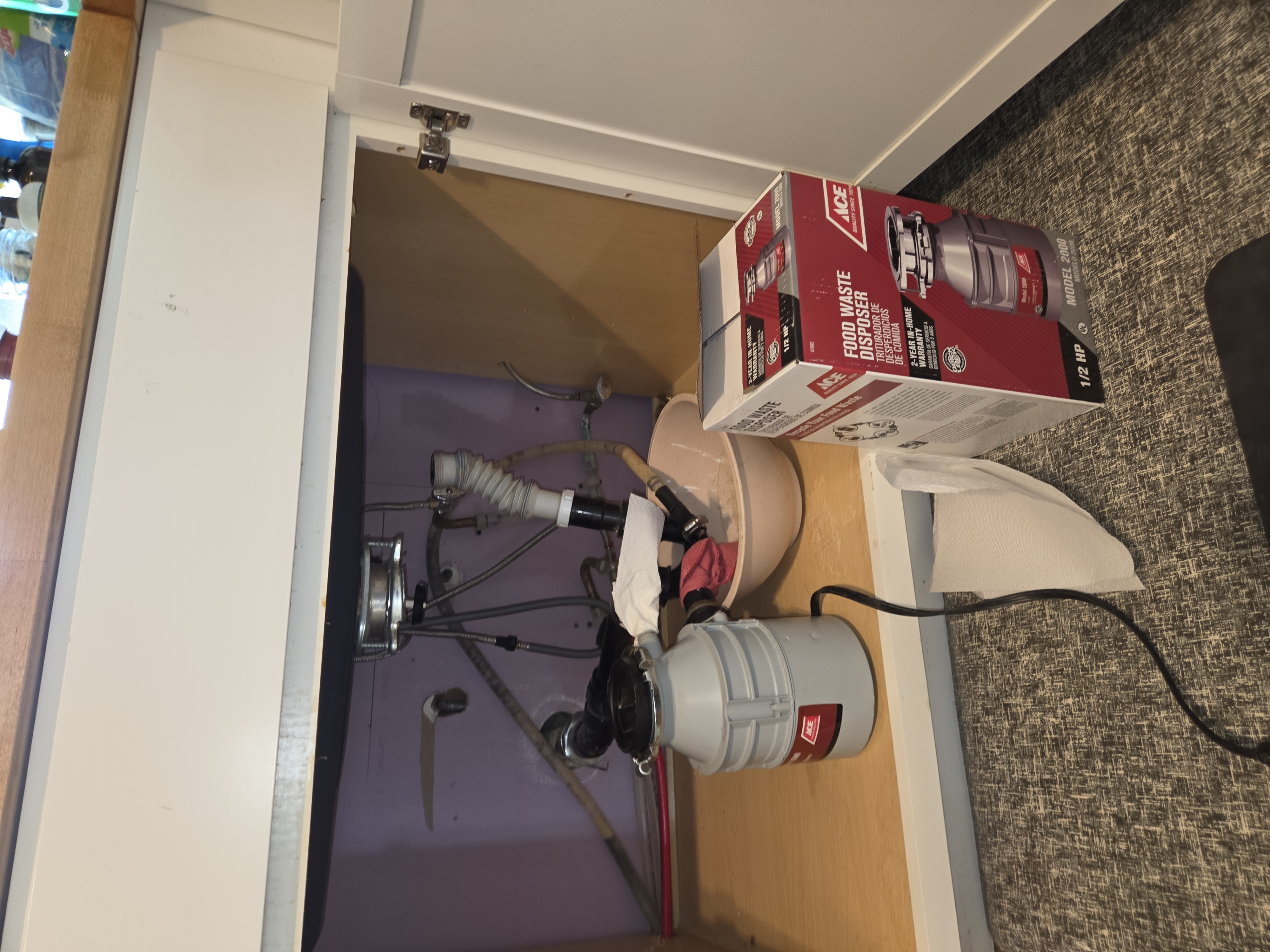 Kitchen sink area before garbage disposal installation