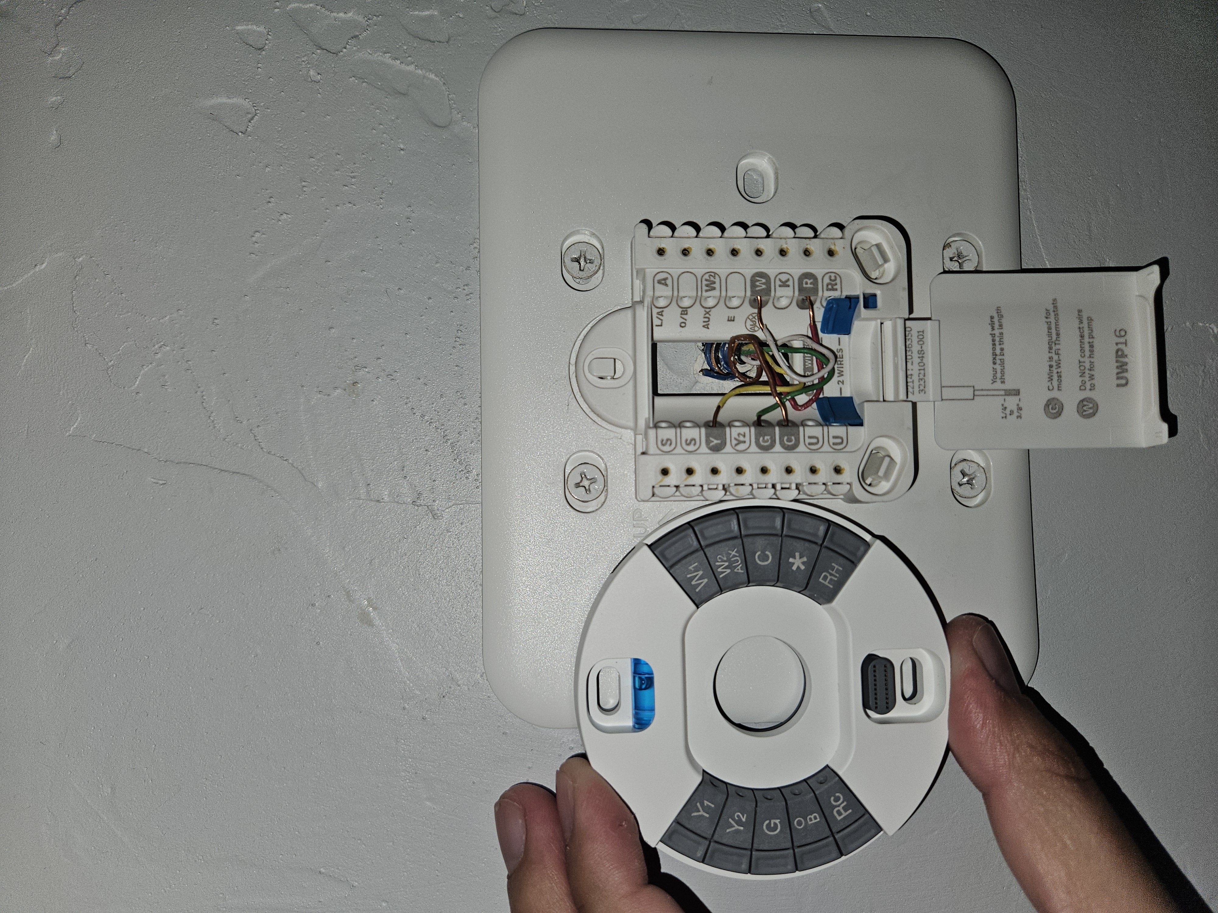 Thermostat wiring and mounting detail during install